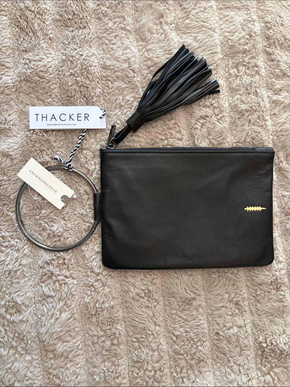 Thacker Black Leather Wristlet Clutch with Gold Accent
